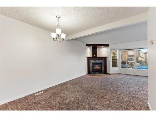 4624 81 Street Nw, Calgary, AB - Indoor With Fireplace