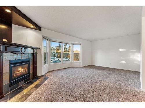 4624 81 Street Nw, Calgary, AB - Indoor Photo Showing Other Room With Fireplace