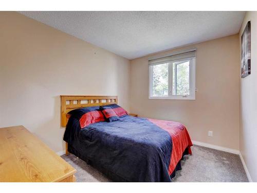 940 Rundlecairn Way Ne, Calgary, AB - Indoor Photo Showing Bedroom