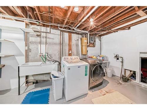 4927 Marlborough Drive Ne, Calgary, AB - Indoor Photo Showing Laundry Room