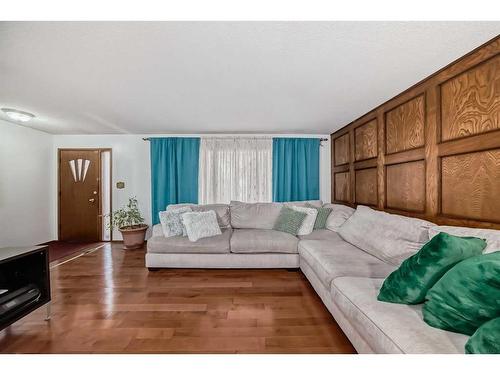 4927 Marlborough Drive Ne, Calgary, AB - Indoor Photo Showing Living Room With Fireplace