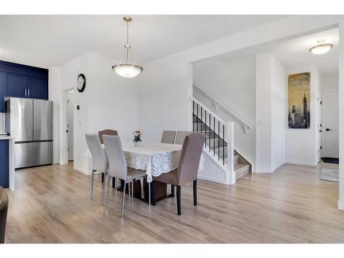 901 Windsong Drive Sw, Airdrie, AB - Indoor Photo Showing Dining Room