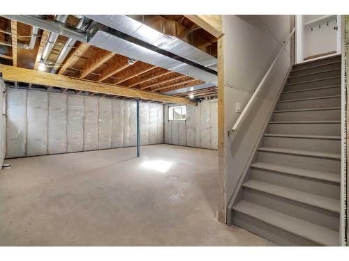 901 Windsong Drive Sw, Airdrie, AB - Indoor Photo Showing Basement