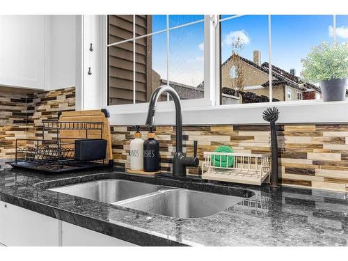 385 Legacy Boulevard Boulevard Se, Calgary, AB - Indoor Photo Showing Kitchen With Double Sink