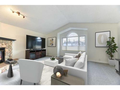 124 Chaparral Crescent Se, Calgary, AB - Indoor Photo Showing Living Room With Fireplace