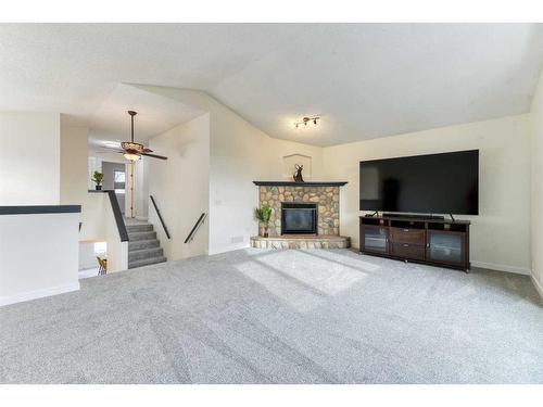 124 Chaparral Crescent Se, Calgary, AB - Indoor Photo Showing Living Room With Fireplace