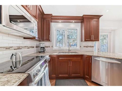 23 Lake Crimson Close, Calgary, AB - Indoor Photo Showing Kitchen With Double Sink