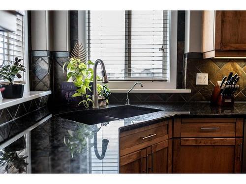 1518 High Park Drive Nw, High River, AB - Indoor Photo Showing Kitchen With Double Sink