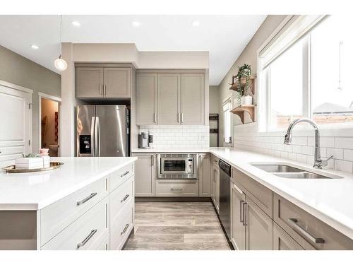 229 Mahogany Parade Se, Calgary, AB - Indoor Photo Showing Kitchen With Double Sink With Upgraded Kitchen