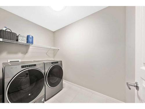 229 Mahogany Parade Se, Calgary, AB - Indoor Photo Showing Laundry Room