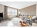 229 Mahogany Parade Se, Calgary, AB  - Indoor Photo Showing Living Room 