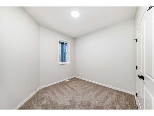 246 Hotchkiss Manor Se, Calgary, AB - Indoor Photo Showing Other Room