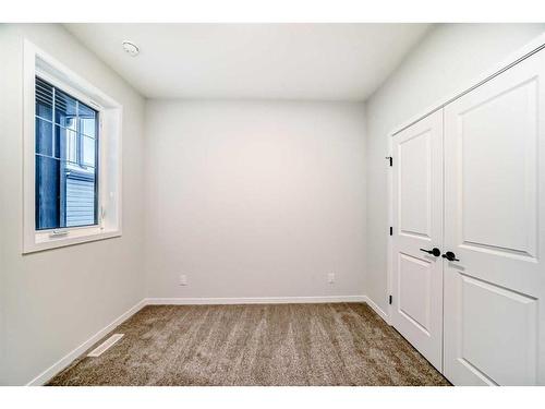 246 Hotchkiss Manor Se, Calgary, AB - Indoor Photo Showing Other Room