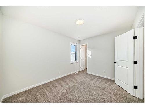 246 Hotchkiss Manor Se, Calgary, AB - Indoor Photo Showing Other Room