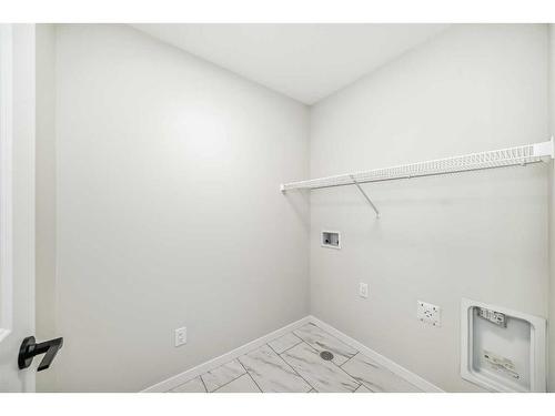 246 Hotchkiss Manor Se, Calgary, AB - Indoor With Storage