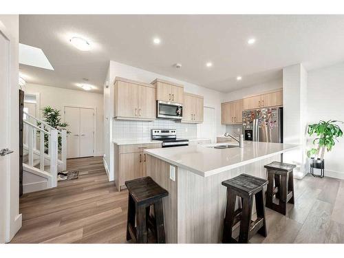 507 Monterey Drive Se, High River, AB - Indoor Photo Showing Kitchen With Double Sink With Upgraded Kitchen