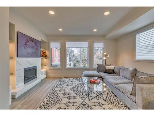 538 23 Avenue Sw, Calgary, AB - Indoor Photo Showing Living Room With Fireplace