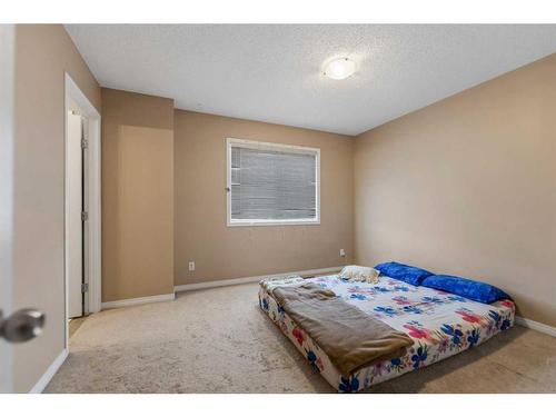 13 Copperfield Court Se, Calgary, AB - Indoor Photo Showing Bedroom