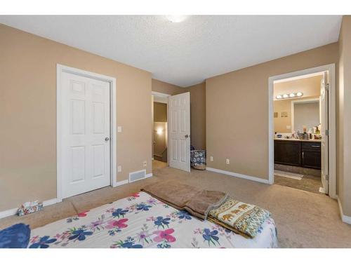 13 Copperfield Court Se, Calgary, AB - Indoor Photo Showing Bedroom