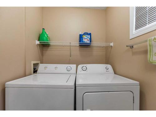 13 Copperfield Court Se, Calgary, AB - Indoor Photo Showing Laundry Room