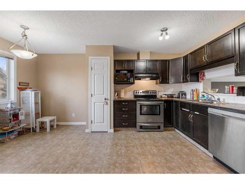 13 Copperfield Court Se, Calgary, AB - Indoor Photo Showing Kitchen