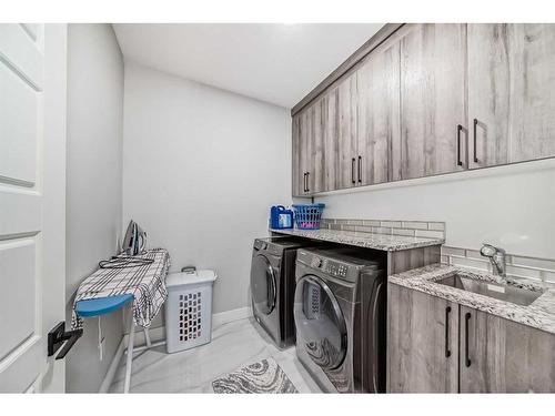 92 Saddlecrest Link Ne, Calgary, AB - Indoor Photo Showing Laundry Room