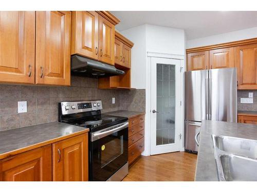 42 Royal Oak Grove Nw, Calgary, AB - Indoor Photo Showing Kitchen With Stainless Steel Kitchen With Double Sink