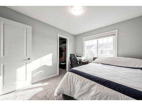 1-1407 3 Street Se, High River, AB - Indoor Photo Showing Bedroom