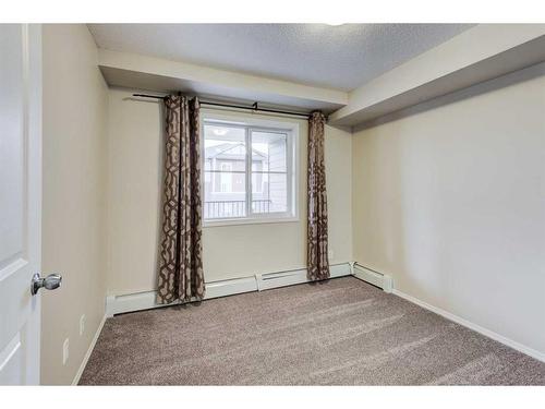 1335-81 Legacy Boulevard Se, Calgary, AB - Indoor Photo Showing Other Room