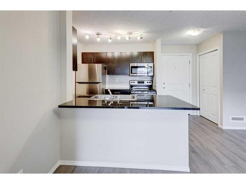 1335-81 Legacy Boulevard Se, Calgary, AB - Indoor Photo Showing Kitchen With Stainless Steel Kitchen