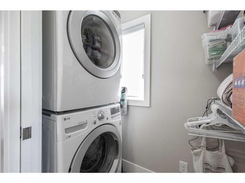 446 Quarry Way Se, Calgary, AB - Indoor Photo Showing Laundry Room