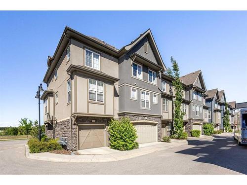 446 Quarry Way Se, Calgary, AB - Outdoor With Facade