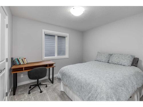 132 Sunrise Common, Cochrane, AB - Indoor Photo Showing Bedroom