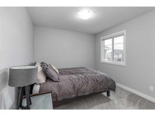 132 Sunrise Common, Cochrane, AB - Indoor Photo Showing Bedroom