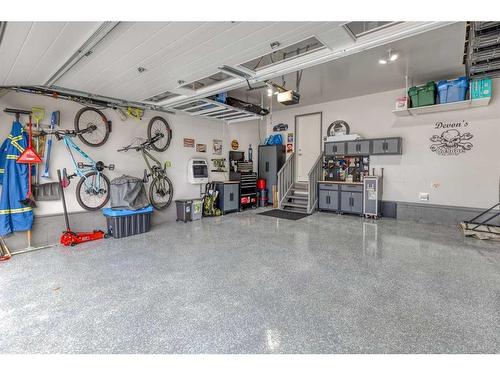 132 Sunrise Common, Cochrane, AB - Indoor Photo Showing Garage