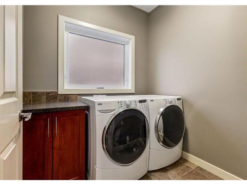 111 Cranleigh Terrace Se, Calgary, AB - Indoor Photo Showing Laundry Room