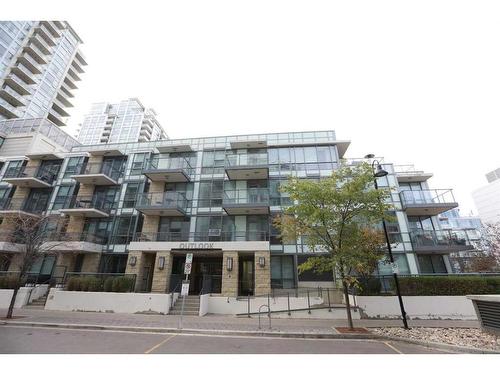 304-51 Waterfront Mews Sw, Calgary, AB - Outdoor With Balcony With Facade