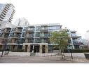 304-51 Waterfront Mews Sw, Calgary, AB  - Outdoor With Balcony With Facade 