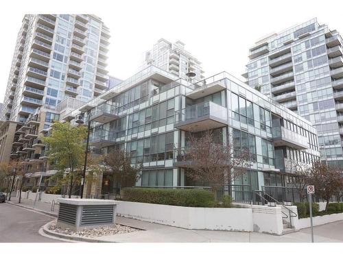 304-51 Waterfront Mews Sw, Calgary, AB - Outdoor With Balcony With Facade