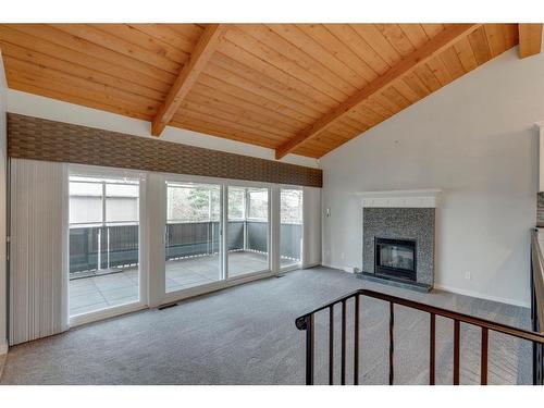 3020 Palliser Drive Sw, Calgary, AB - Indoor With Fireplace