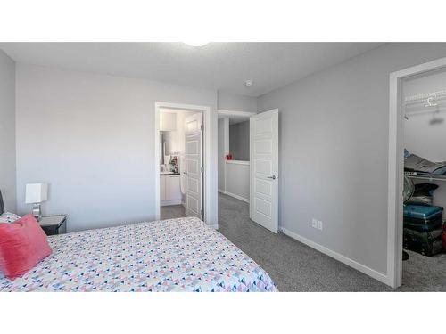 303-70 Saddlestone Drive Ne, Calgary, AB - Indoor Photo Showing Bedroom