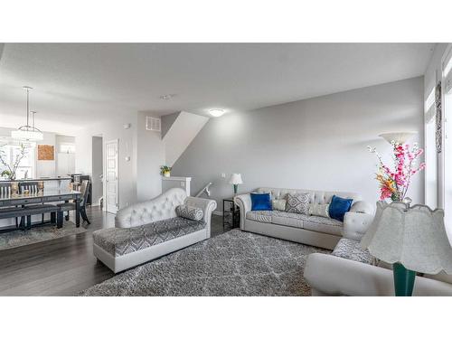 303-70 Saddlestone Drive Ne, Calgary, AB - Indoor Photo Showing Living Room