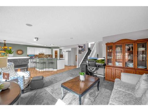 113 West Lakeview Crescent, Chestermere, AB - Indoor Photo Showing Living Room With Fireplace