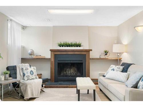 543 Summerwood Place Se, Airdrie, AB - Indoor Photo Showing Living Room With Fireplace