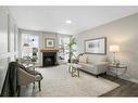 543 Summerwood Place Se, Airdrie, AB  - Indoor Photo Showing Living Room With Fireplace 