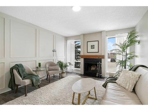 543 Summerwood Place Se, Airdrie, AB - Indoor Photo Showing Living Room With Fireplace