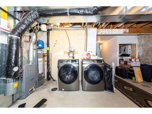 71 Hidden Creek Rise Nw, Calgary, AB - Indoor Photo Showing Laundry Room