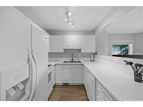 1308 154 Avenue Sw, Calgary, AB - Indoor Photo Showing Kitchen With Double Sink