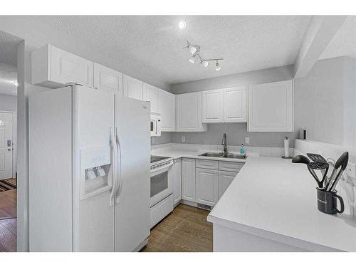 1308 154 Avenue Sw, Calgary, AB - Indoor Photo Showing Kitchen With Double Sink