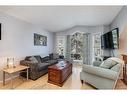 79 Covington Close Ne, Calgary, AB  - Indoor Photo Showing Living Room 